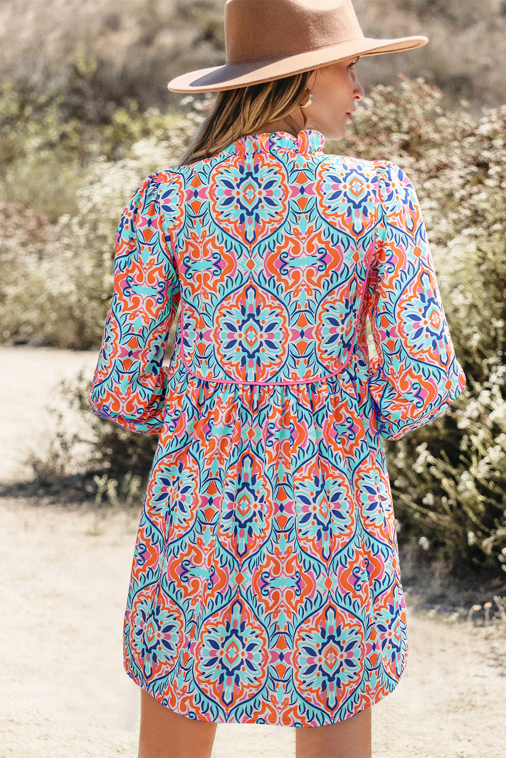 Abstract Long Sleeve Tied Neck Mini Dress