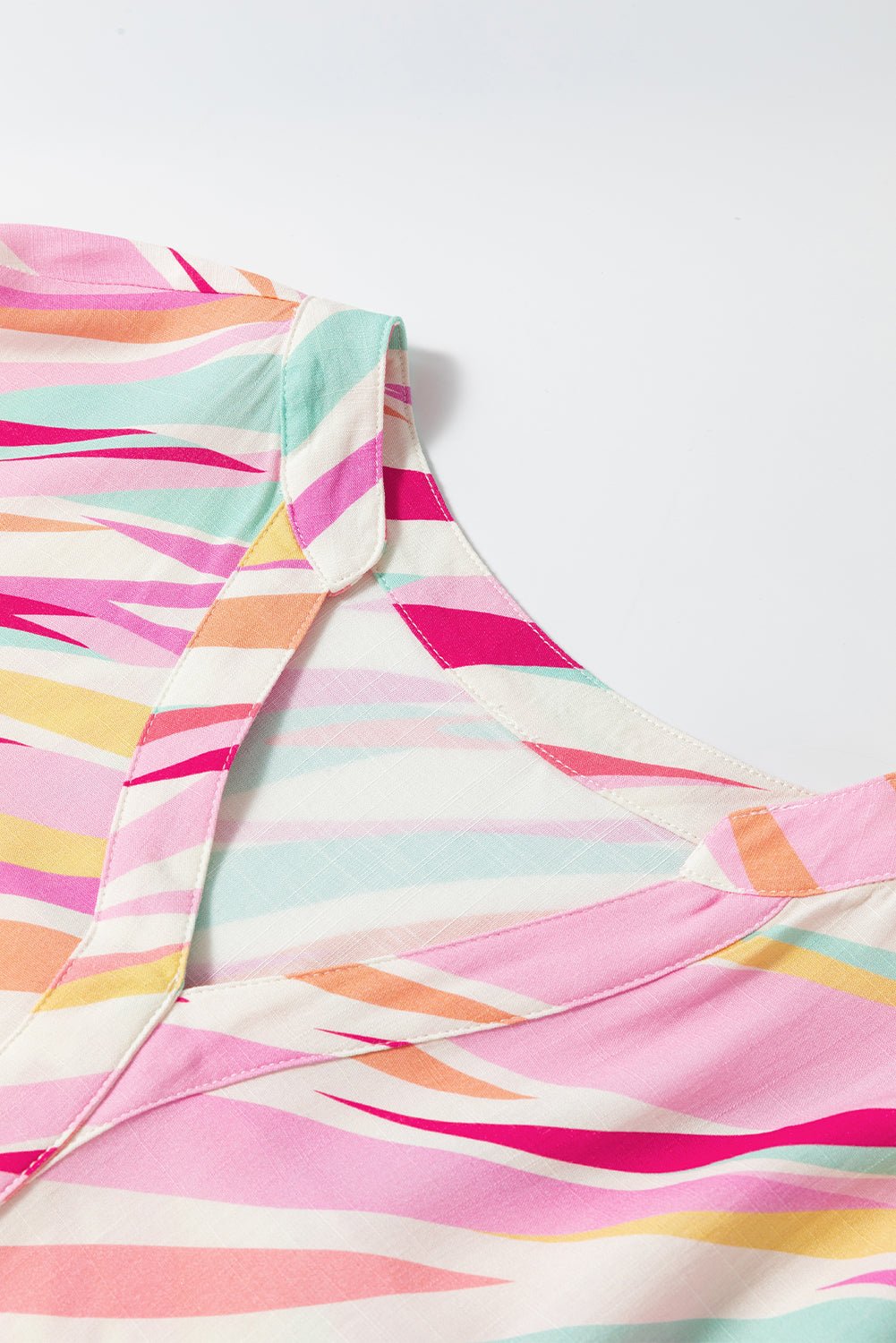 Abstract High Low Short Sleeve Blouse - Rooted & Reckless Co.