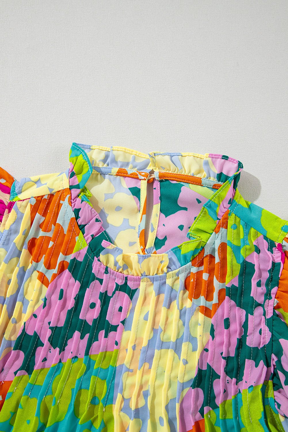 Abstract Leopard Pleated Flutter Sleeve Blouse - Rooted & Reckless Co.
