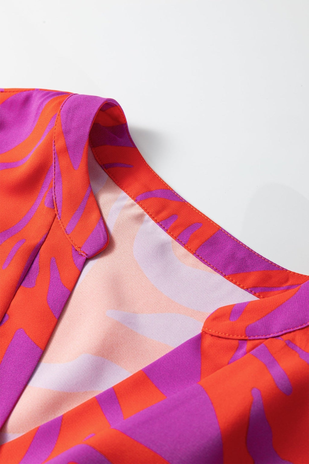 Abstract V-Neck Cuffed Short Sleeve Blouse - Rooted & Reckless Co.