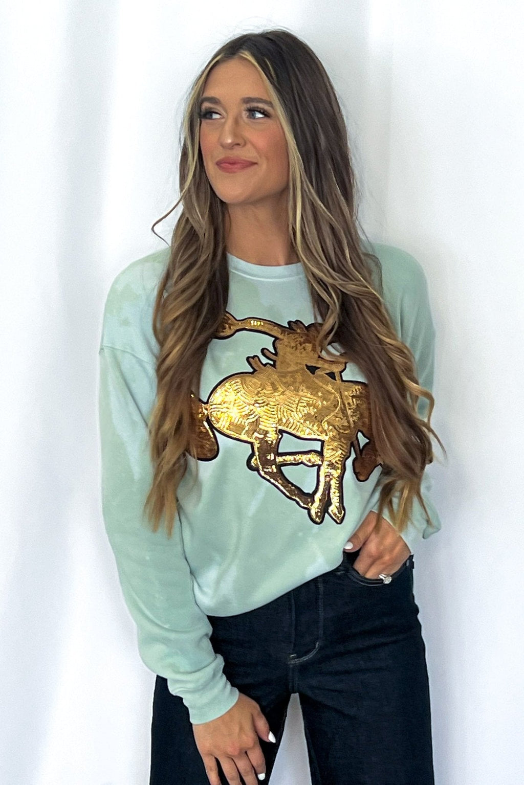 Crazy Consuela "Gold Sequin Horse" Bleached Western Sweatshirt — Bella + Canvas Aqua Sky Background with Cowboy Patch - Rooted & Reckless Co.