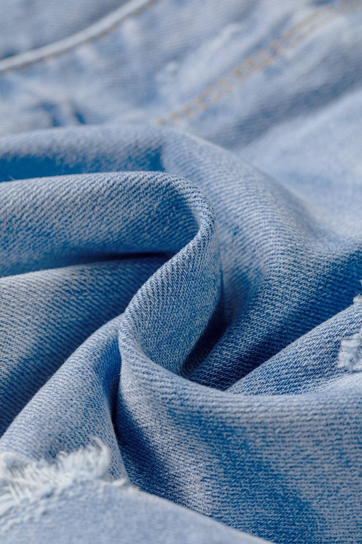 Distressed Denim Asymmetric Raw Hem Shorts - Rooted & Reckless Co.