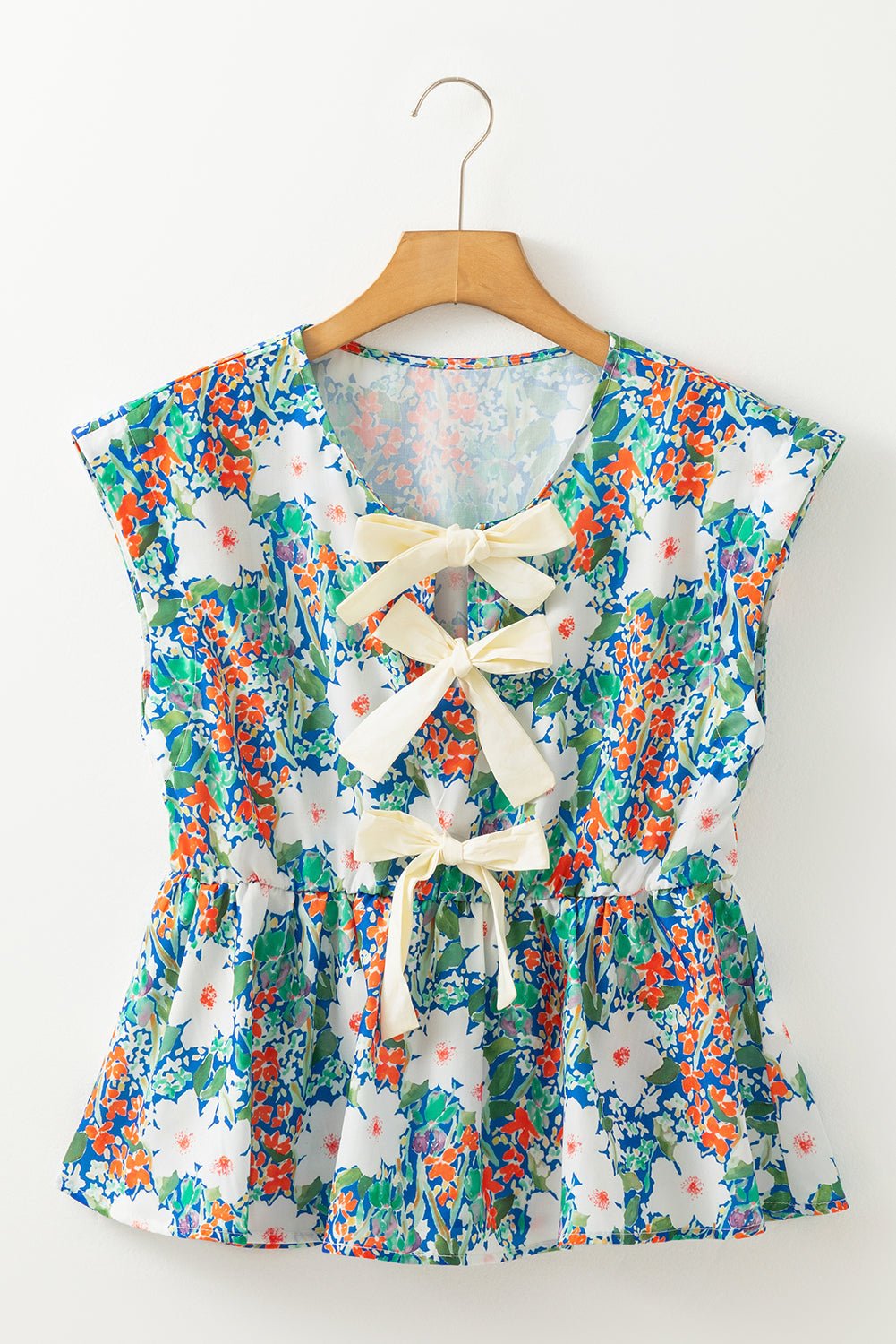 Floral Bow Tie Sleeveless Peplum Blouse - Rooted & Reckless Co.