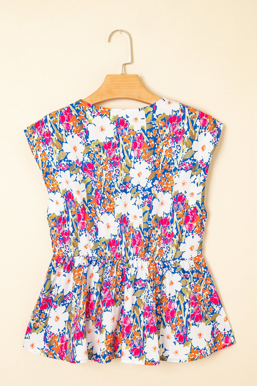 Floral Bow Tie Sleeveless Peplum Blouse - Rooted & Reckless Co.