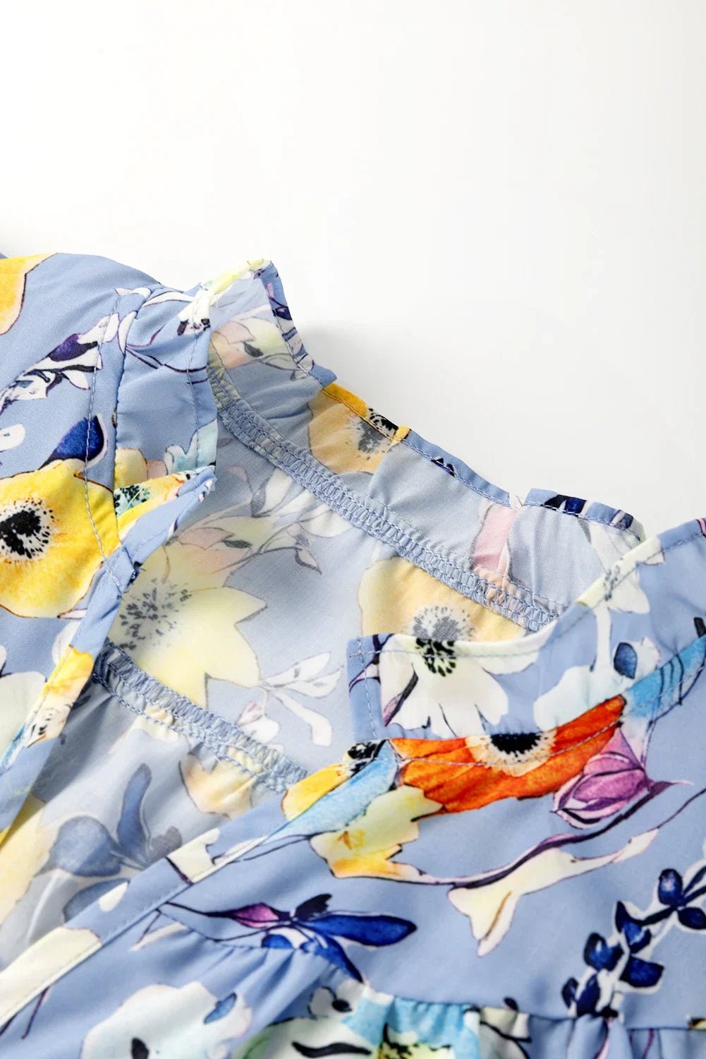 Floral Flutter Sleeve V-Neck Top - Rooted & Reckless Co.