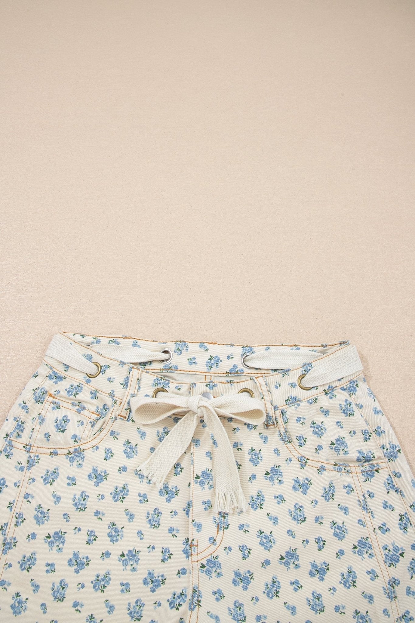 Floral Grommet Knot Waist Barrel Leg Jeans - Rooted & Reckless Co.