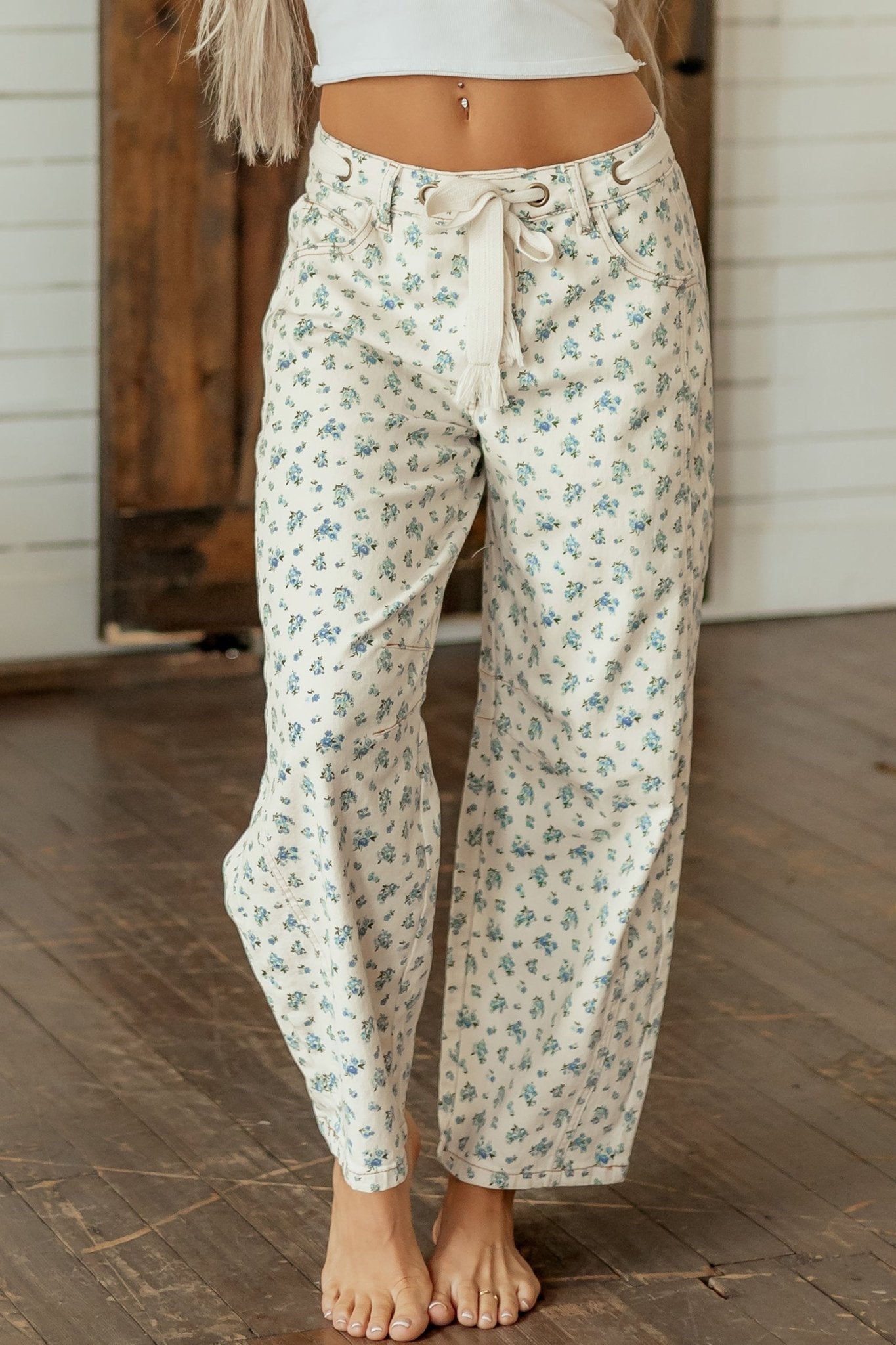 Floral Grommet Knot Waist Barrel Leg Jeans - Rooted & Reckless Co.