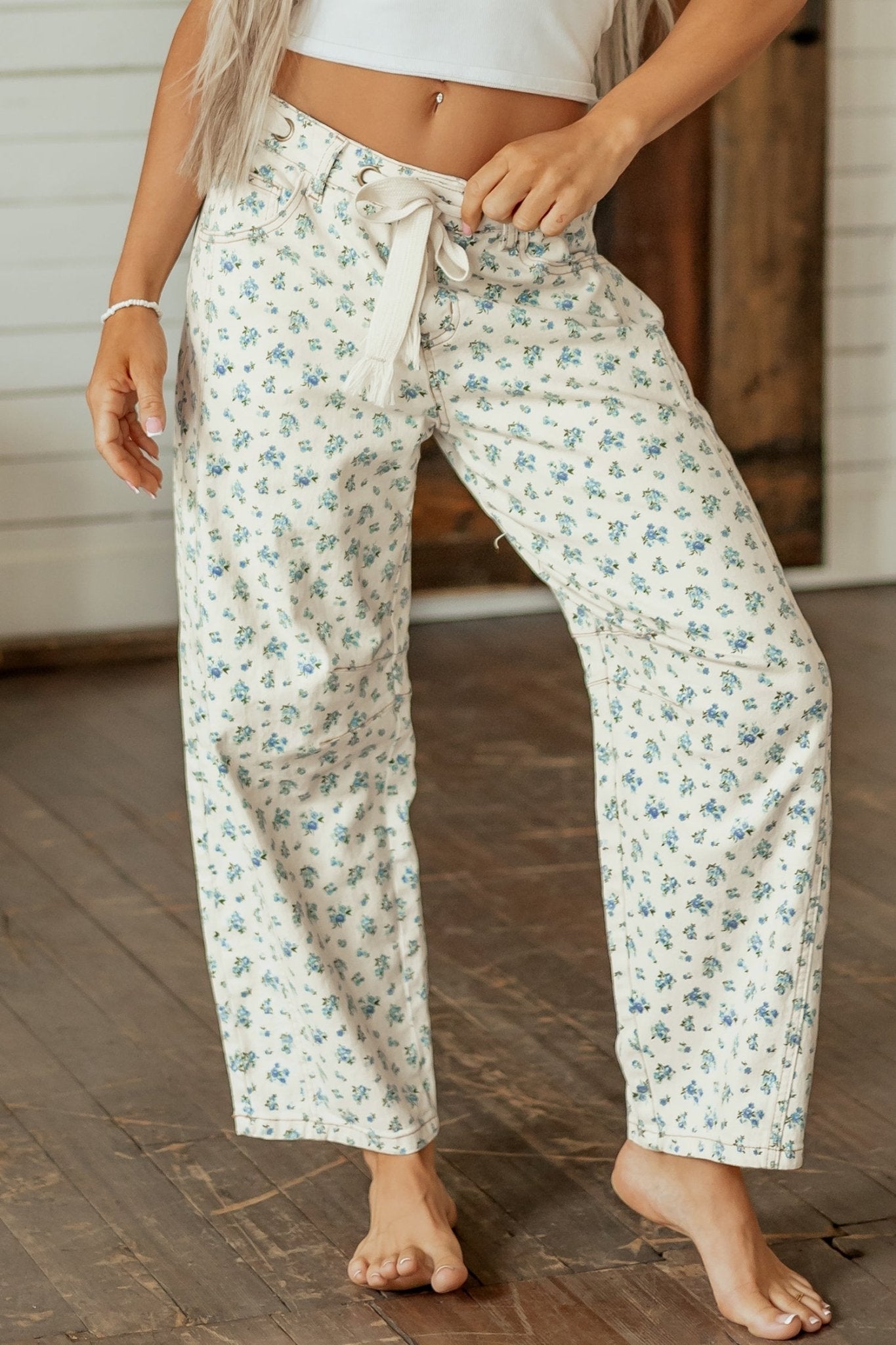 Floral Grommet Knot Waist Barrel Leg Jeans - Rooted & Reckless Co.