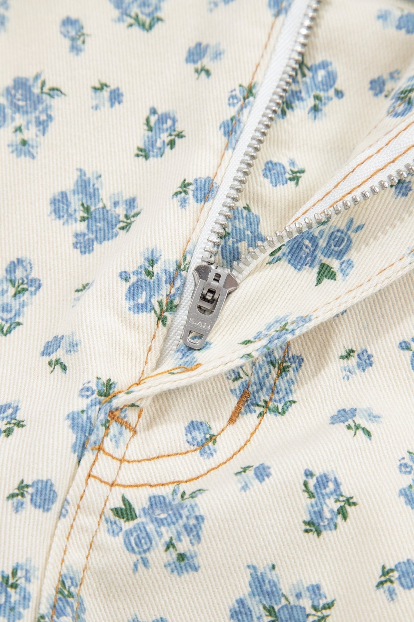 Floral Grommet Knot Waist Barrel Leg Jeans - Rooted & Reckless Co.