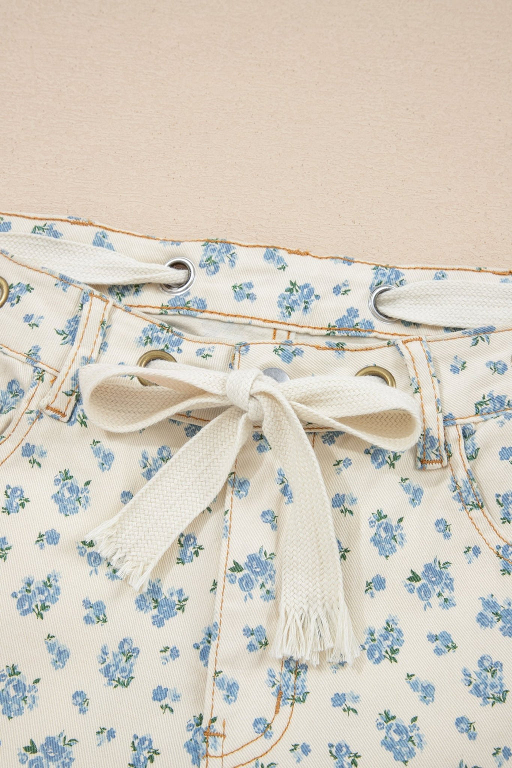 Floral Grommet Knot Waist Barrel Leg Jeans - Rooted & Reckless Co.