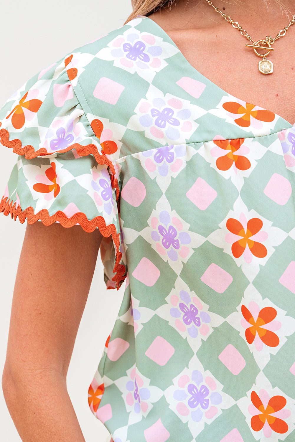 Geometric Floral V-Neck Layered Flutter Sleeve Blouse - Rooted & Reckless Co.