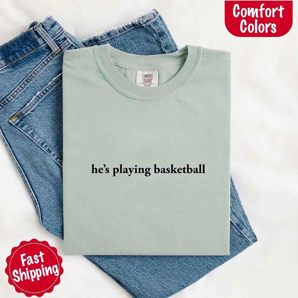 He’s Playing Basketball – Funny Sports Girlfriend Comfort Color Shirt for Women - Rooted & Reckless Co.
