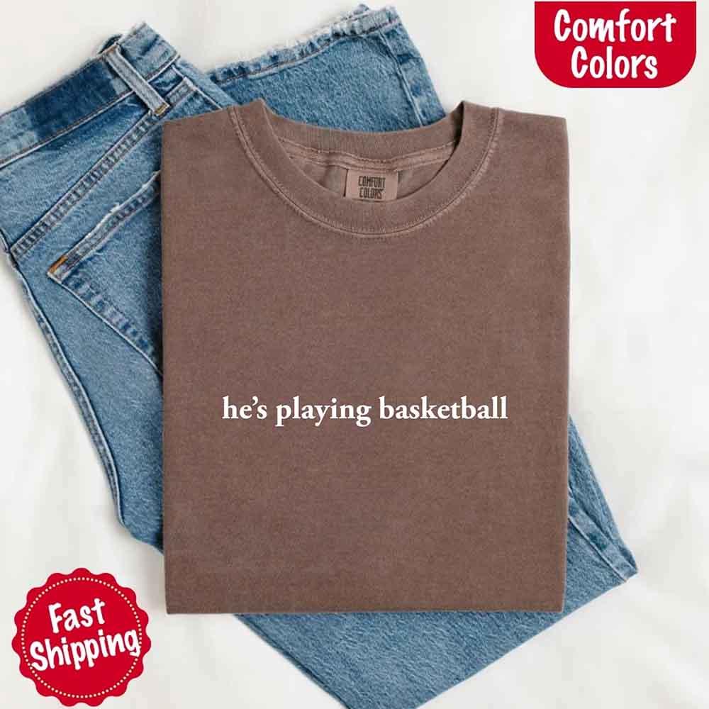 He’s Playing Basketball – Funny Sports Girlfriend Comfort Color Shirt for Women - Rooted & Reckless Co.
