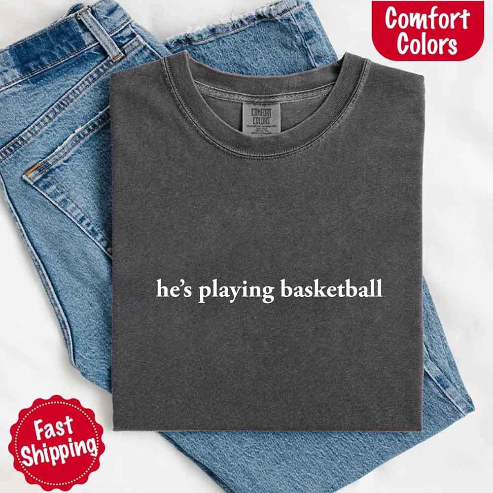 He’s Playing Basketball – Funny Sports Girlfriend Comfort Color Shirt for Women - Rooted & Reckless Co.