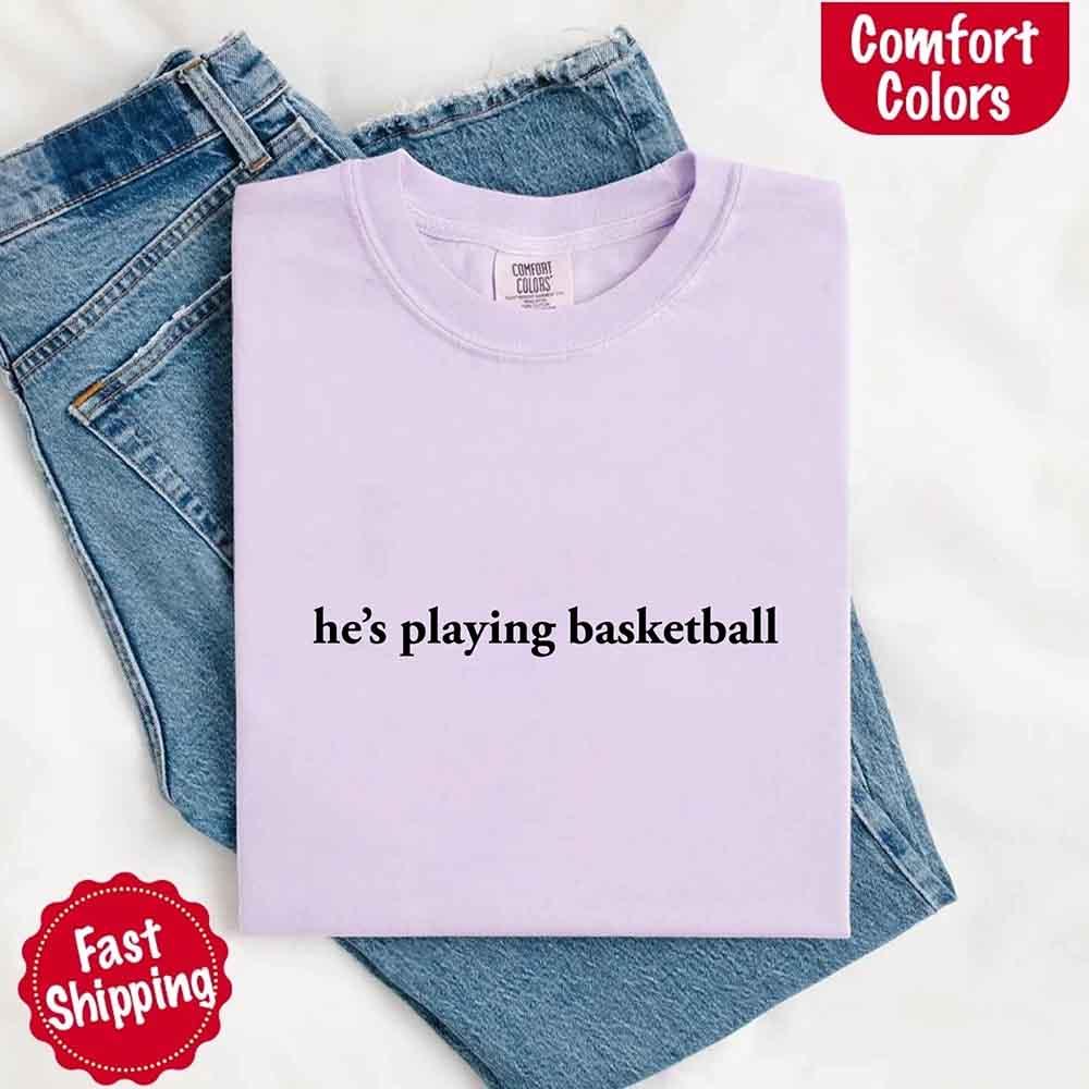 He’s Playing Basketball – Funny Sports Girlfriend Comfort Color Shirt for Women - Rooted & Reckless Co.