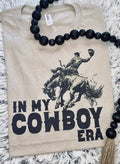 "In My Cowboy Era" Western Graphic Tee — Tan Jerzee Sublimation Print Wild West Statement - Rooted & Reckless Co.