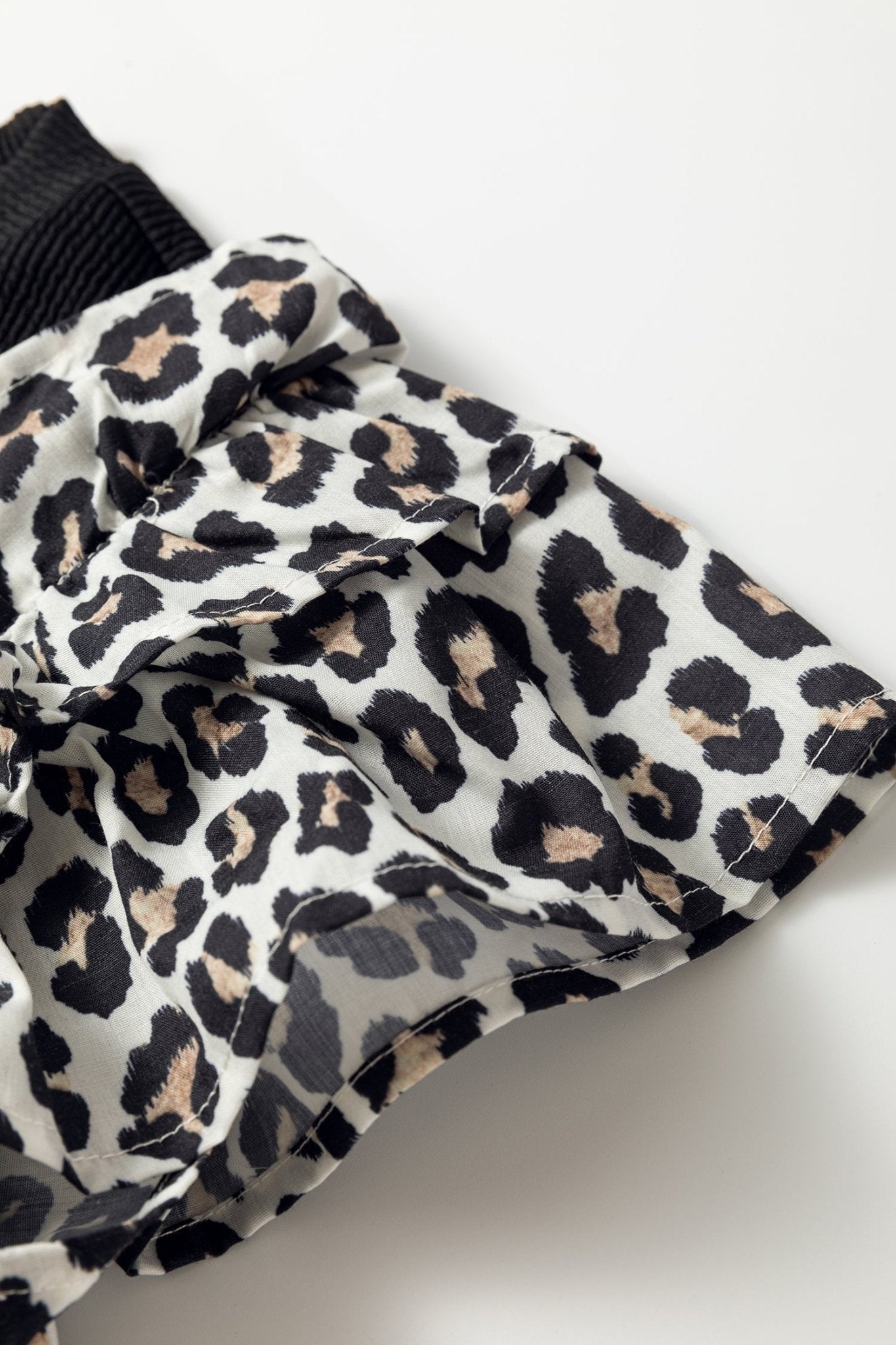 Leopard Contrast Ruffle Short Sleeve Ribbed Top - Rooted & Reckless Co.