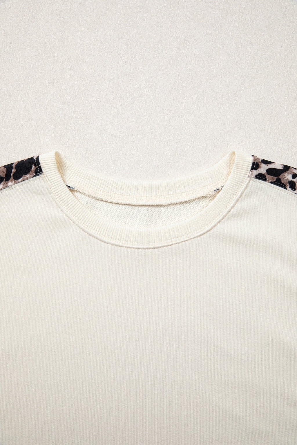 Leopard Patchwork Uneven Hem Short Sleeve Top - Rooted & Reckless Co.