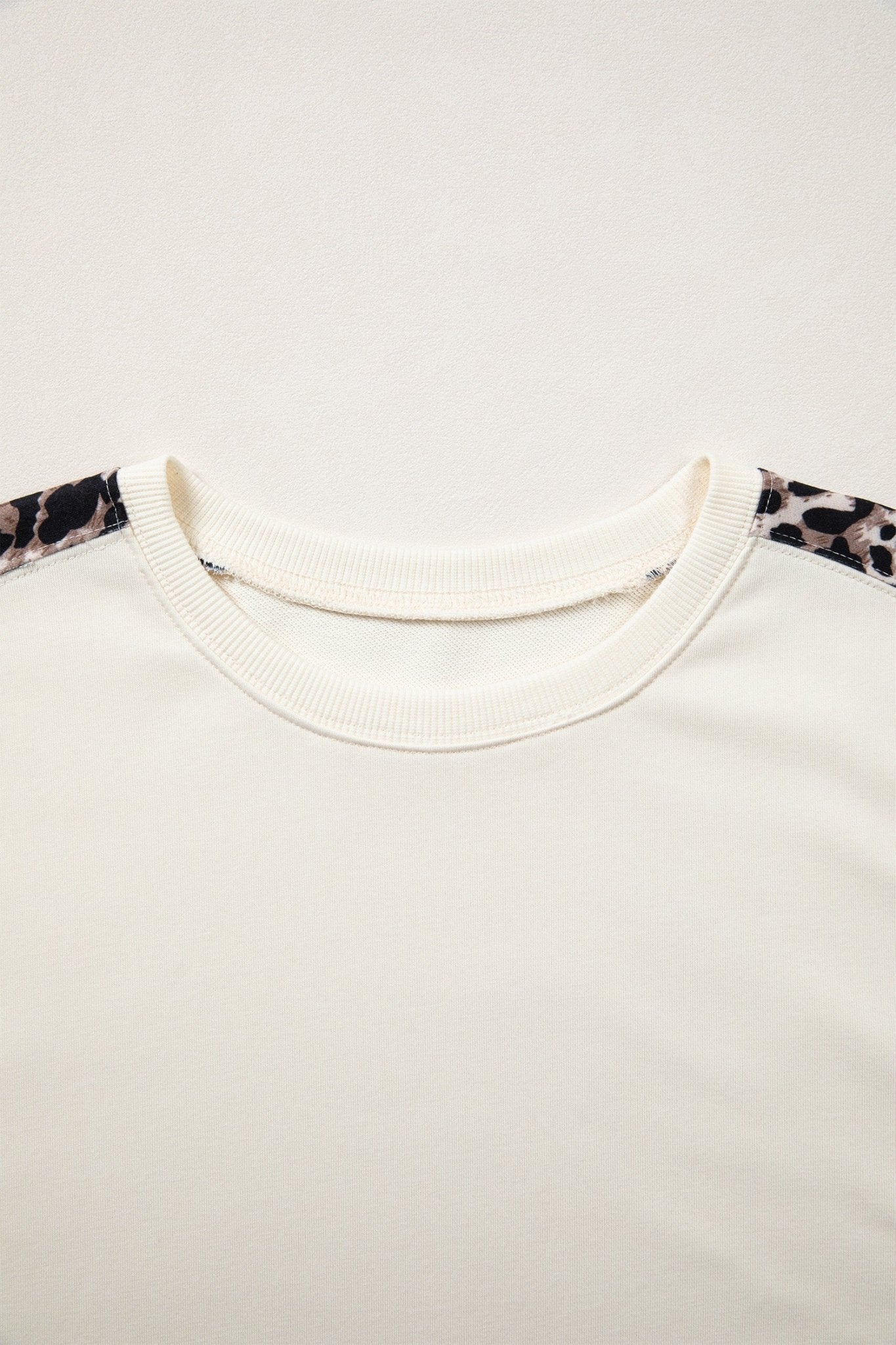 Leopard Patchwork Uneven Hem Short Sleeve Top - Rooted & Reckless Co.