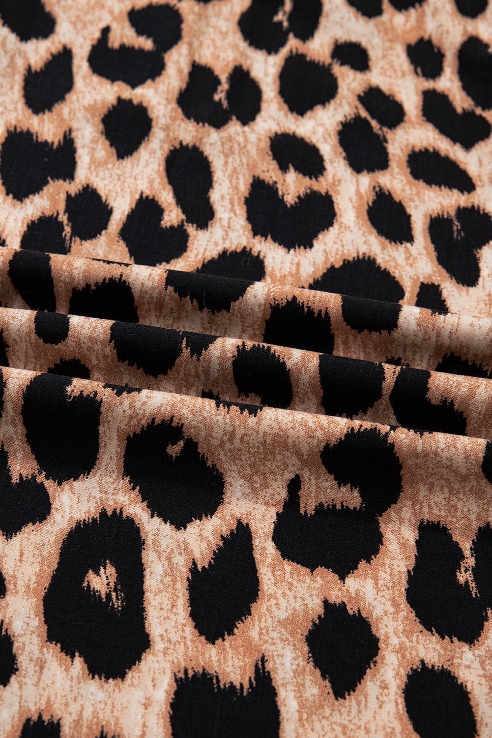 Leopard Smocked V-Neck Flowy Midi Dress - Rooted & Reckless Co.