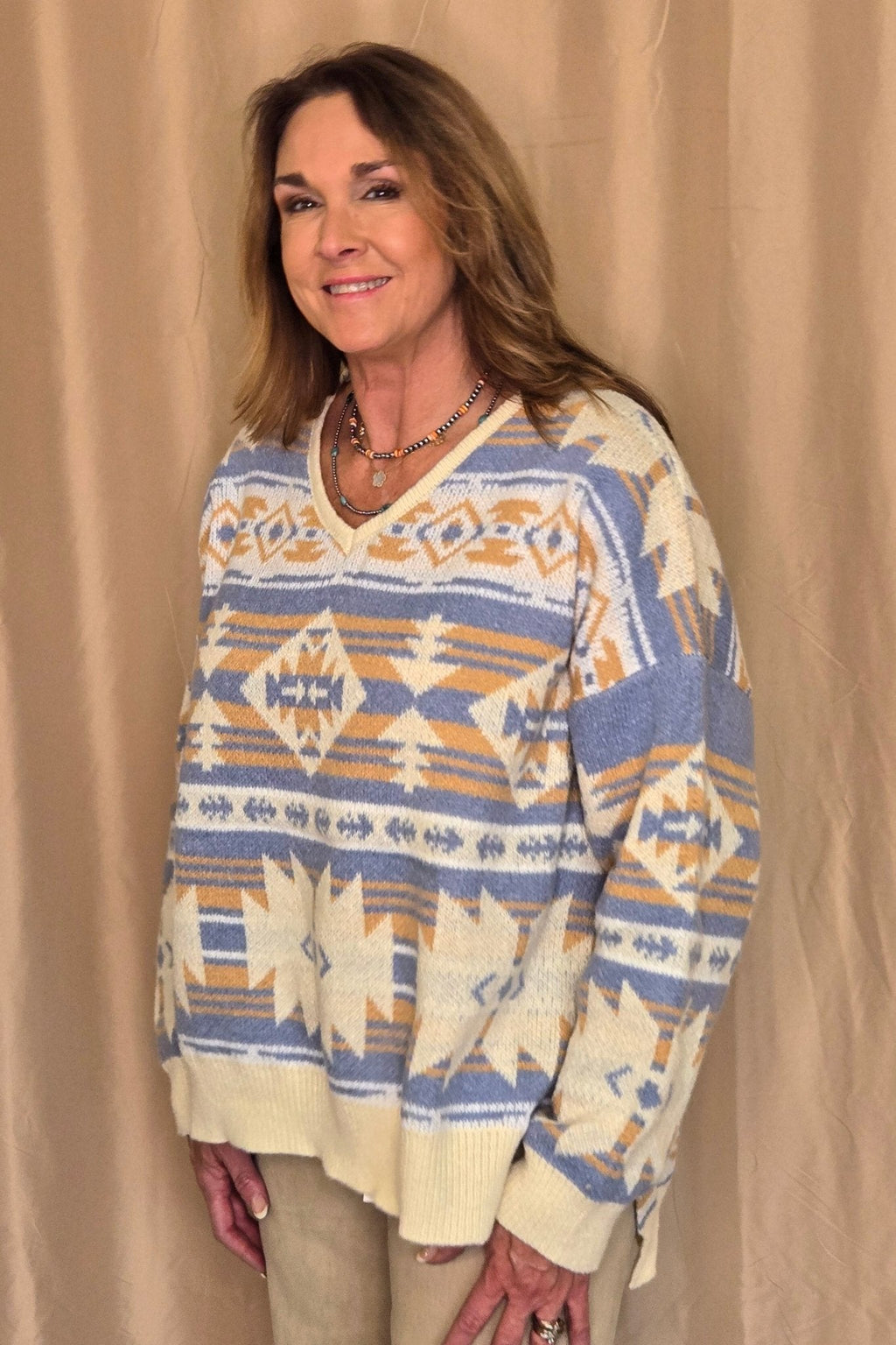 Main Strip Southwestern Knit Sweater — Oversized V-Neck with Bold Blue, Tan & Cream Print - Rooted & Reckless Co.