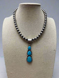 Paul Livingston Navajo Sterling Silver Pendant with Sonoran Gem Turquoise — 2 3/4" Long - Rooted & Reckless Co.