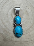 Paul Livingston Navajo Sterling Silver Pendant with Sonoran Gem Turquoise — 2 5/8" Long - Rooted & Reckless Co.