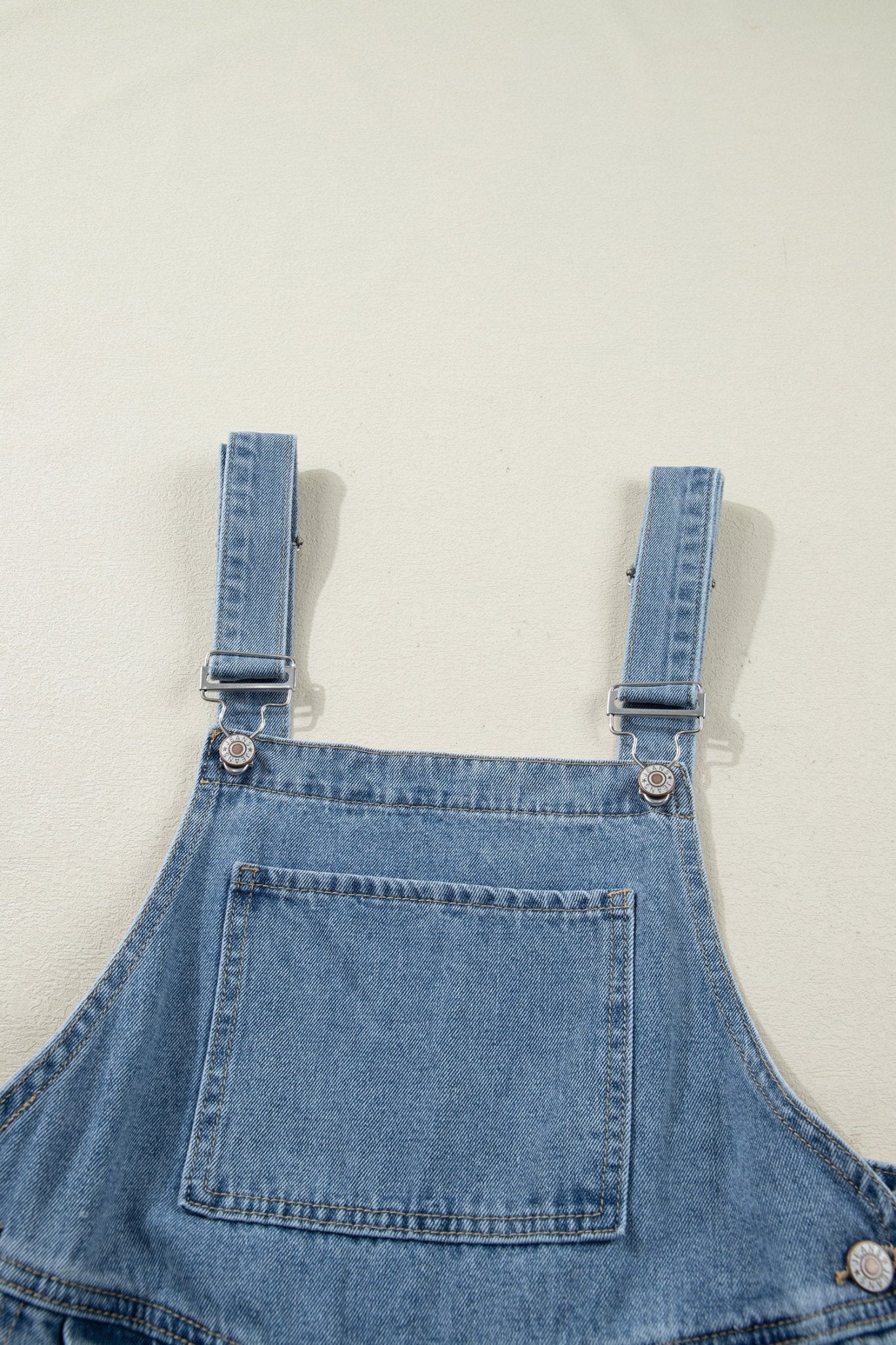 Pleated Wide Leg Pocketed Denim Jumpsuit - Rooted & Reckless Co.