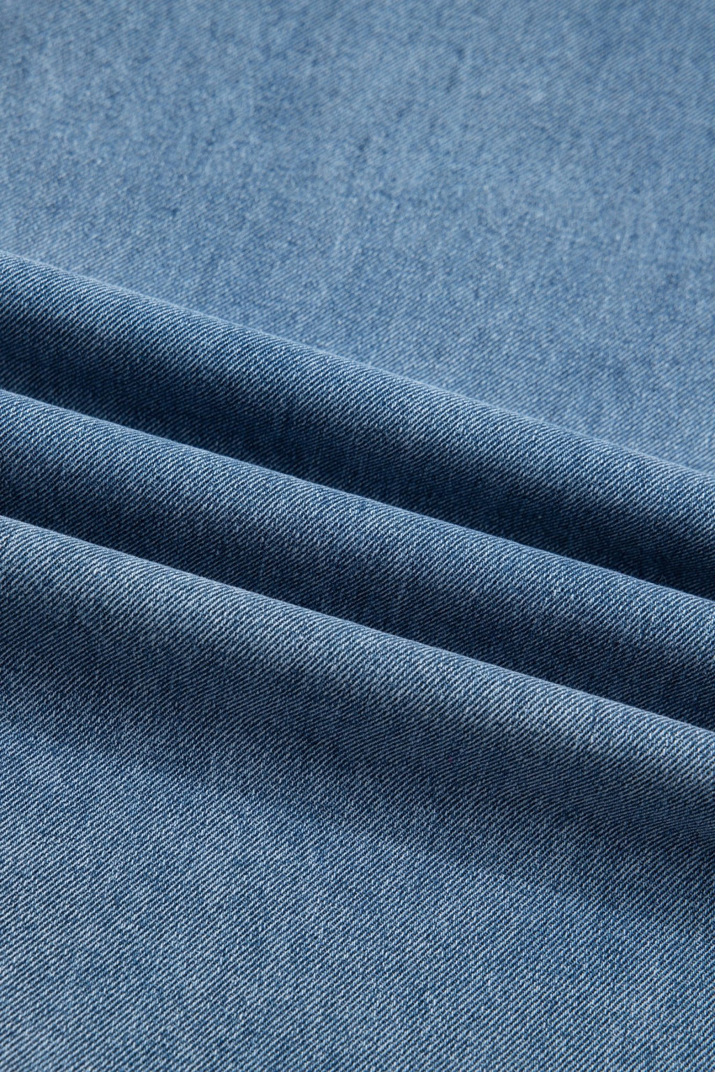 Pleated Wide Leg Pocketed Denim Jumpsuit - Rooted & Reckless Co.