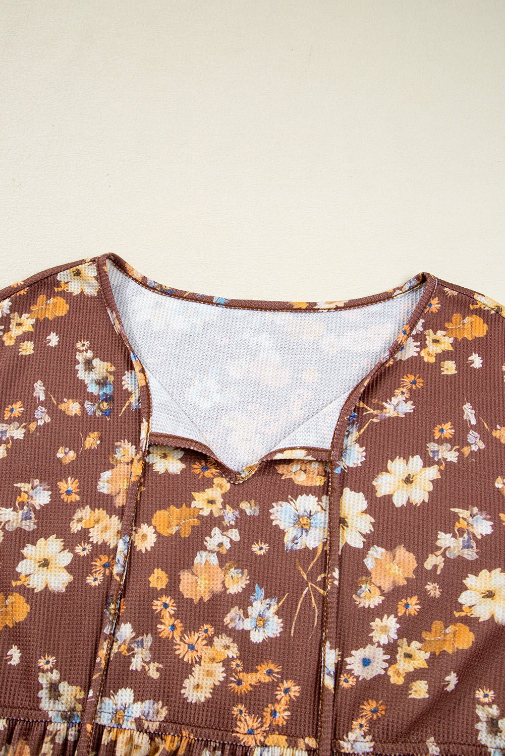 Plus Size Floral Textured Tied Neck Babydoll Blouse - Rooted & Reckless Co.