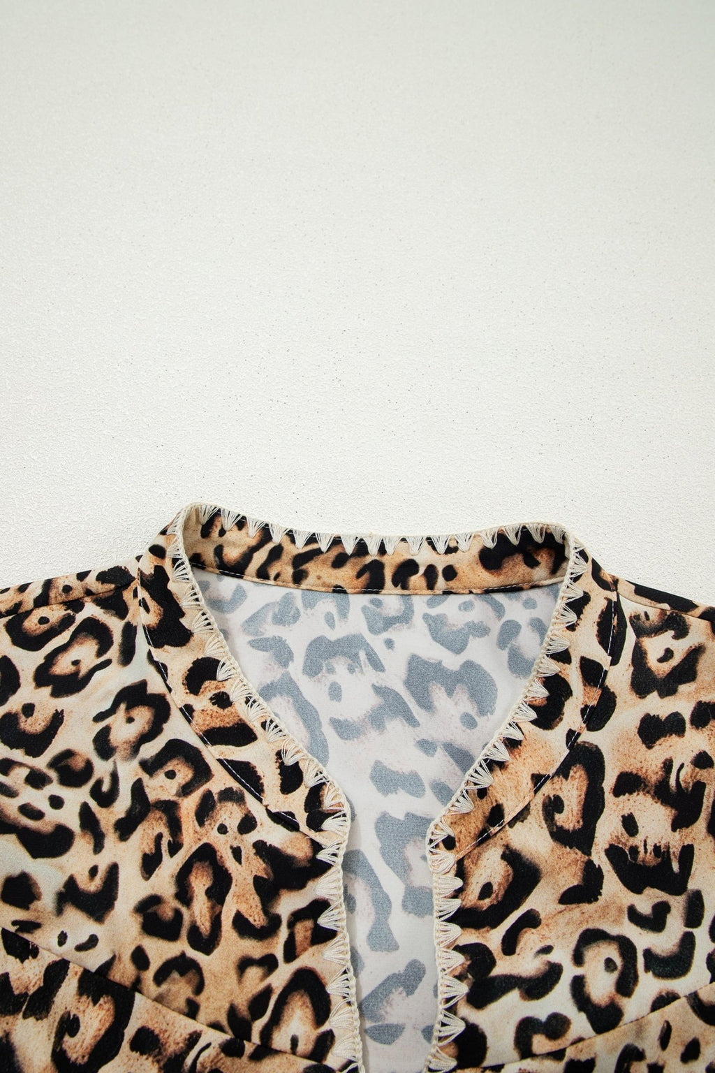 Plus Size Leopard Embroidered Ruffle Short Sleeve Blouse - Rooted & Reckless Co.