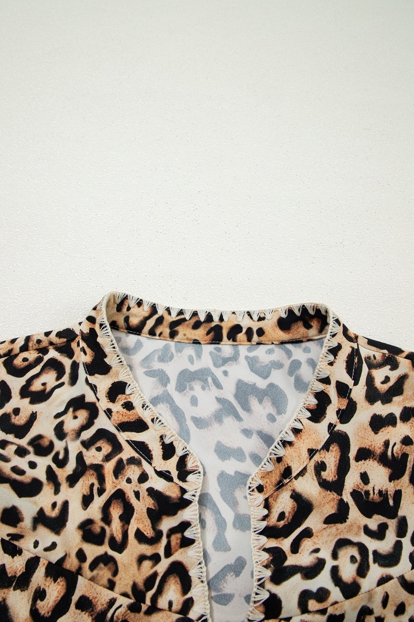 Plus Size Leopard Embroidered Ruffle Short Sleeve Blouse - Rooted & Reckless Co.