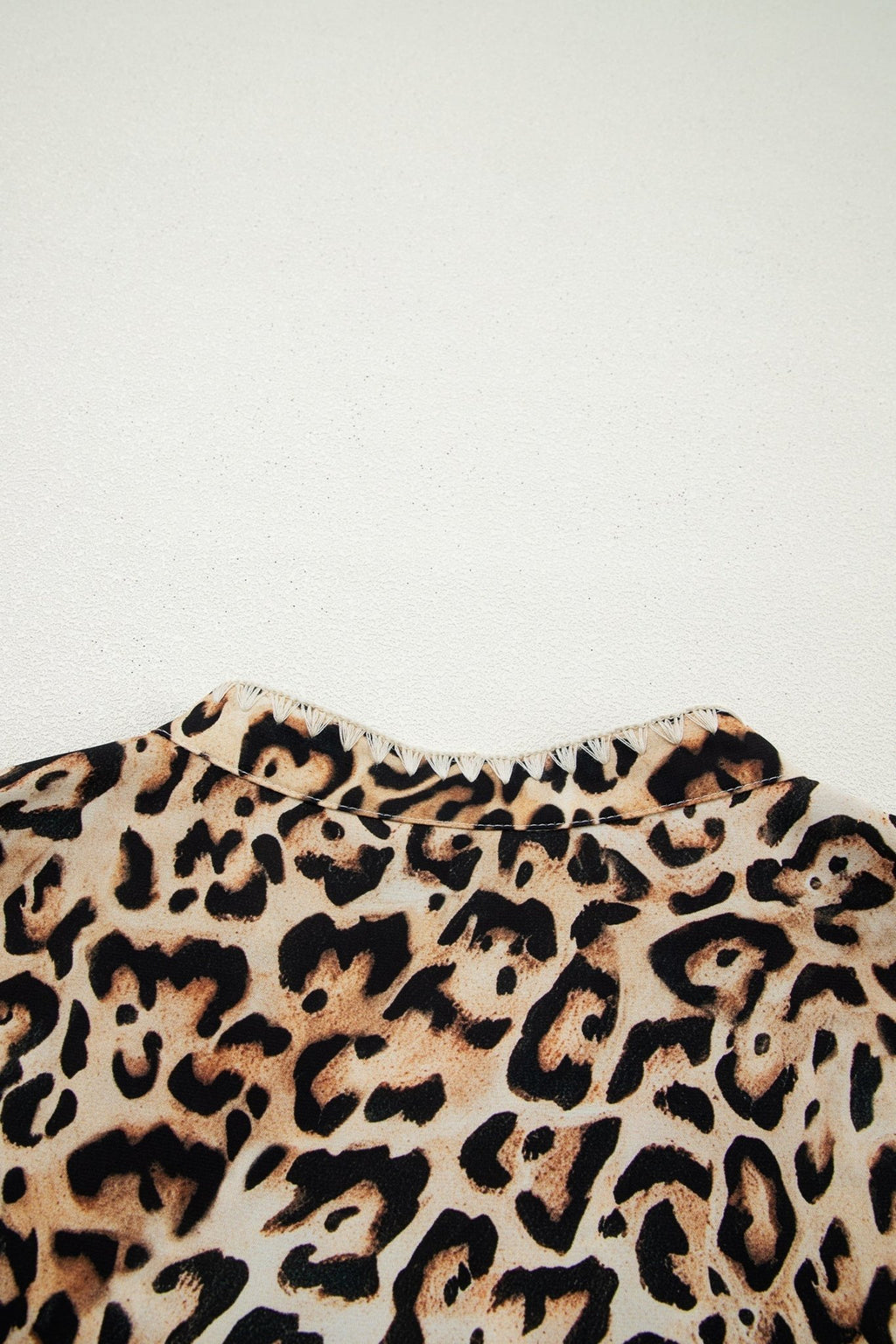 Plus Size Leopard Embroidered Ruffle Short Sleeve Blouse - Rooted & Reckless Co.