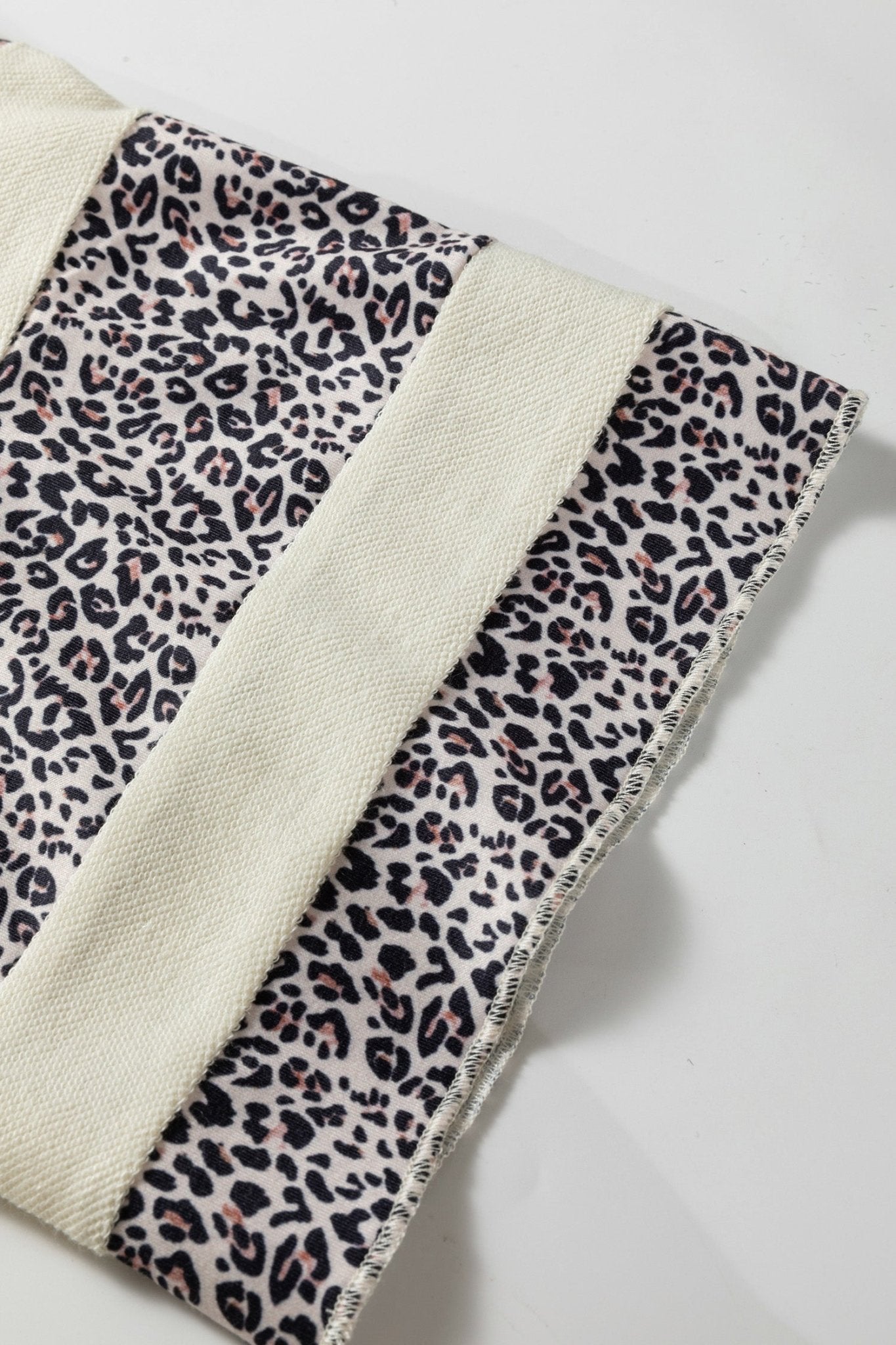Plus Size Leopard Patchwork V-Neck Short Sleeve Top - Rooted & Reckless Co.