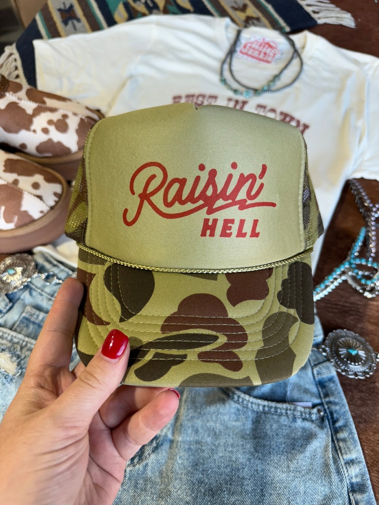 Raisin' Hell Green Camo Trucker Hat - Rooted & Reckless Co.
