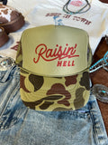 Raisin' Hell Green Camo Trucker Hat - Rooted & Reckless Co.