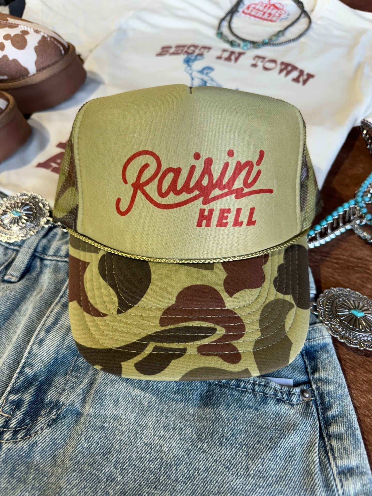 Raisin' Hell Green Camo Trucker Hat - Rooted & Reckless Co.