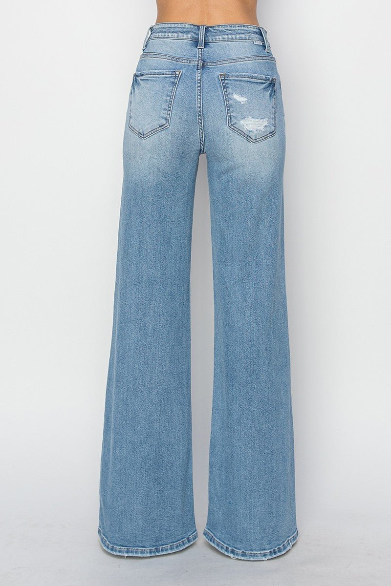 Risen High-Rise Wide Distressed Western Jeans — Light Wash Playful Distressing with Wide-Leg Cut - Rooted & Reckless Co.