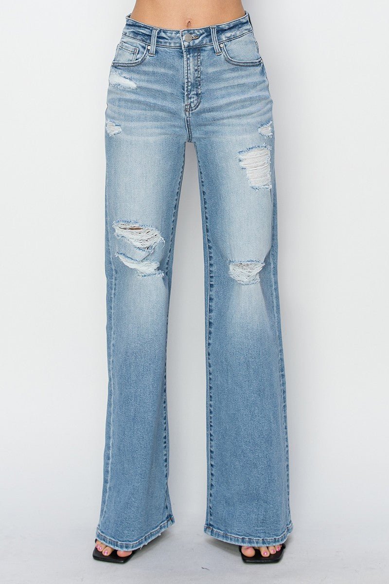 Risen High-Rise Wide Distressed Western Jeans — Light Wash Playful Distressing with Wide-Leg Cut - Rooted & Reckless Co.