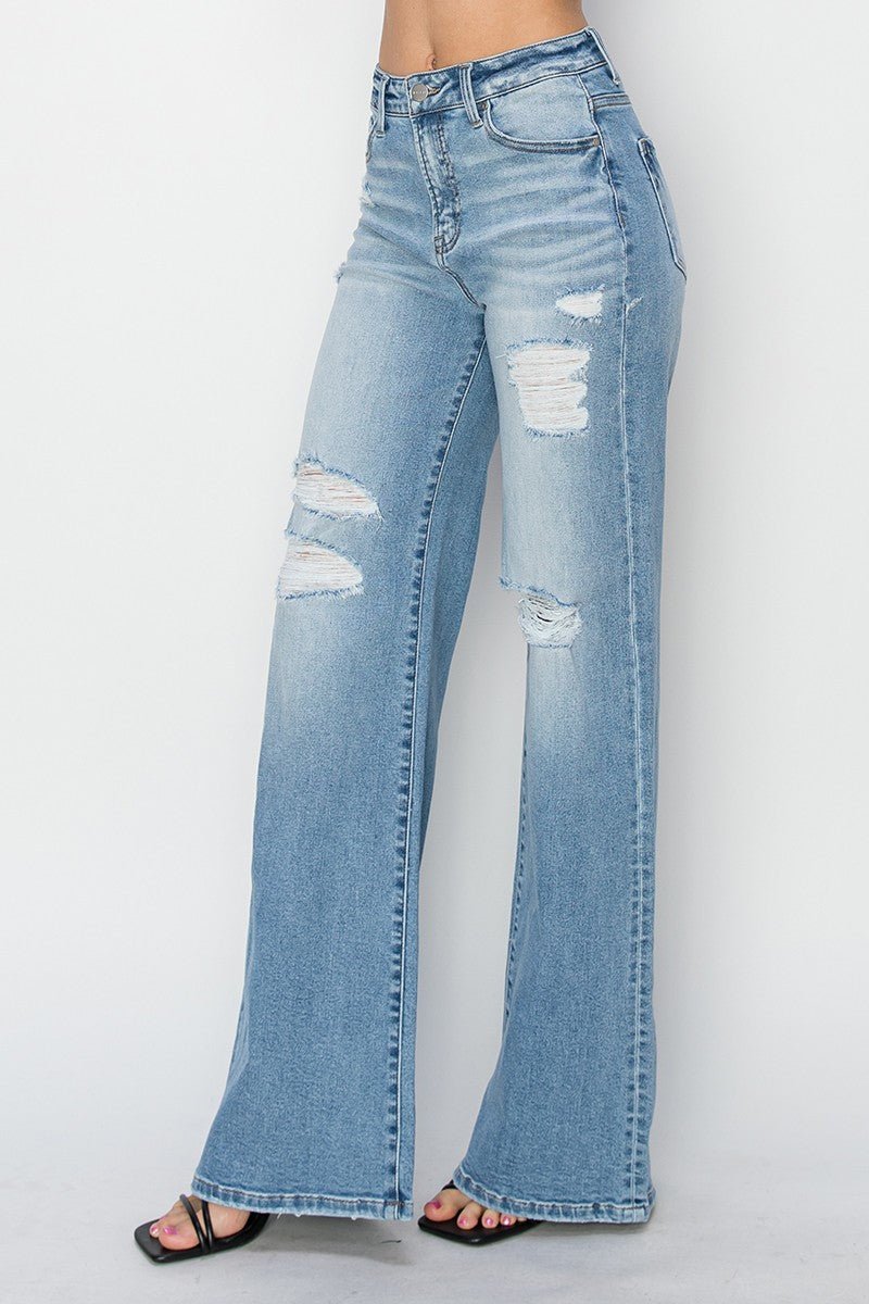 Risen High-Rise Wide Distressed Western Jeans — Light Wash Playful Distressing with Wide-Leg Cut - Rooted & Reckless Co.