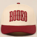 "RODEO" Two-Tone Embroidered Trucker Hat — Wine Red Cotton Canvas with Raised Lettering & 5-Panel Structure - Rooted & Reckless Co.