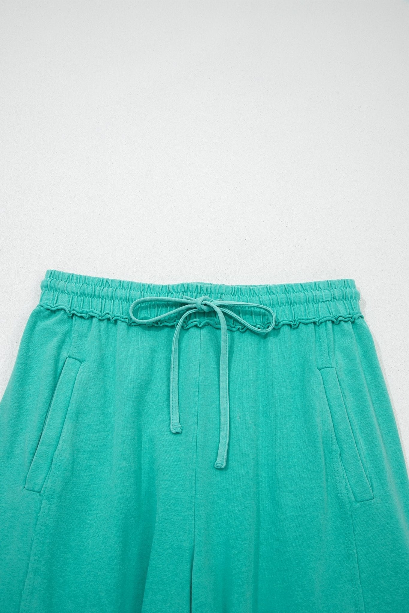Solid Drawstring Elastic Waist Raw Hem Pants - Rooted & Reckless Co.