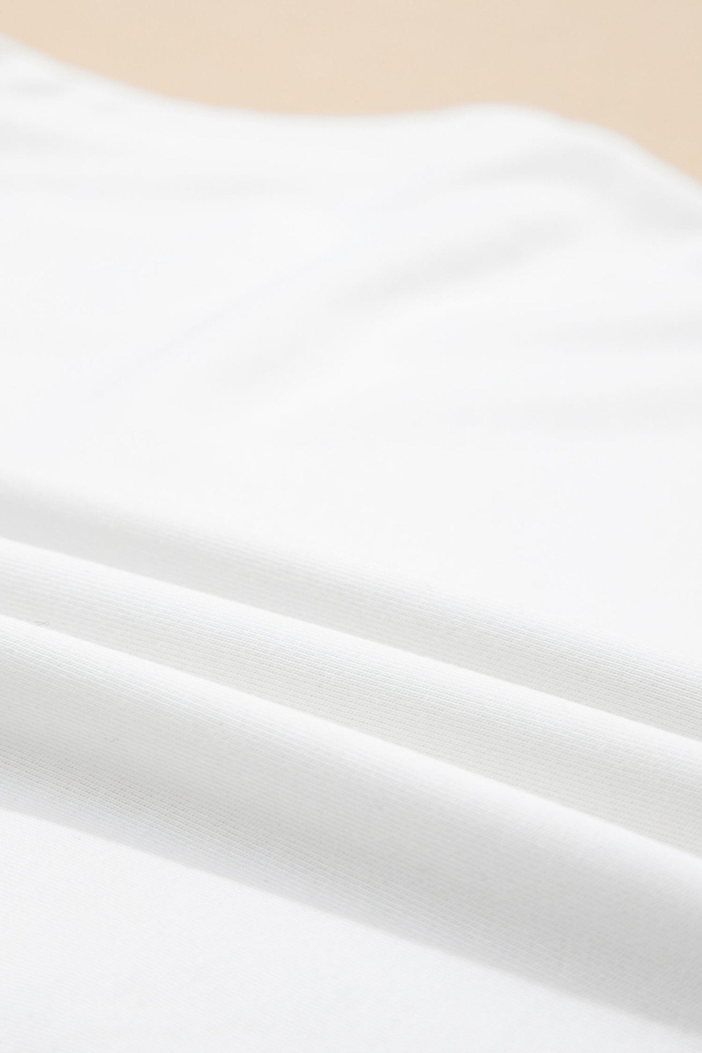 Solid Mock Neck Cap Sleeve Oversized Top - Rooted & Reckless Co.