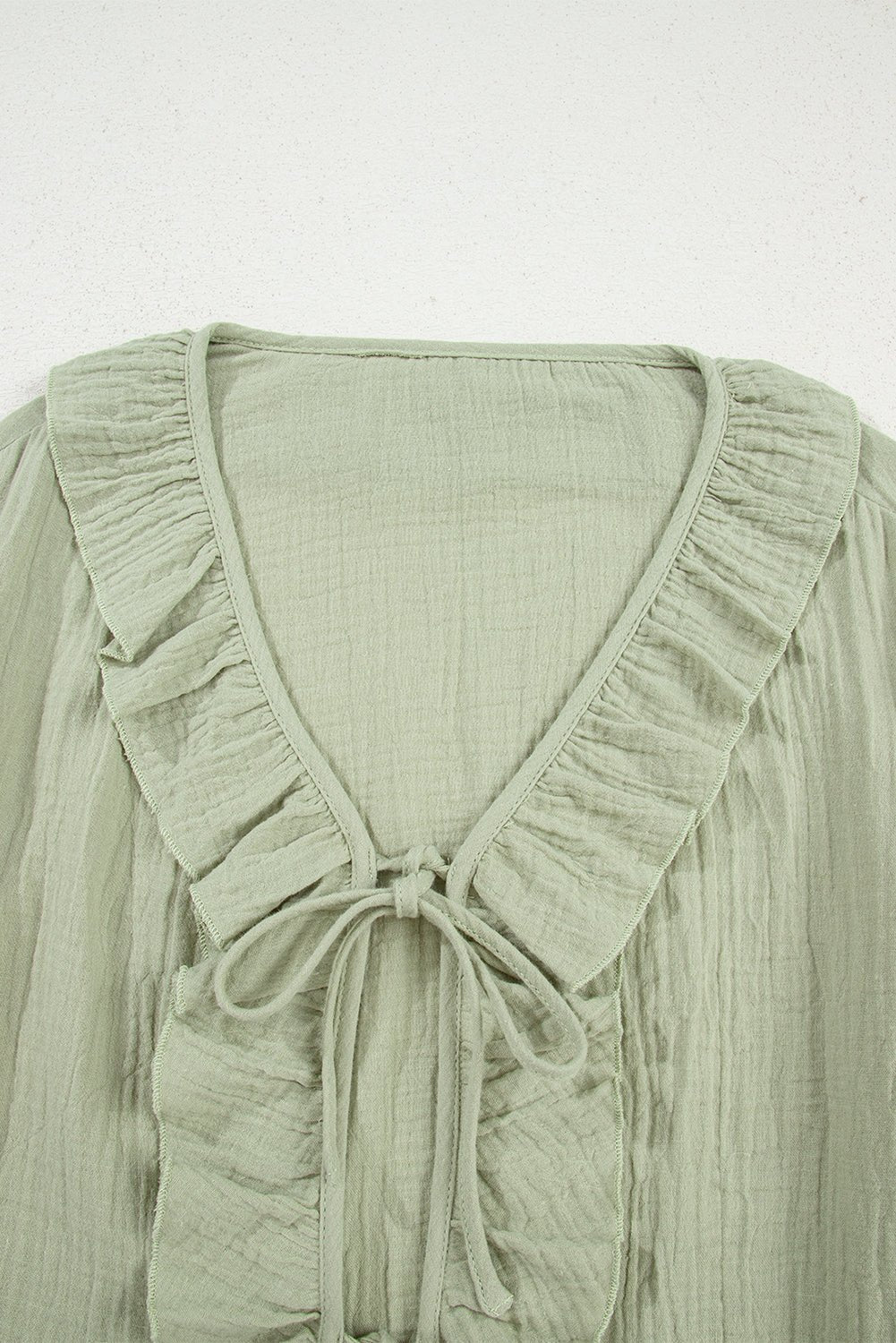 Solid Tie Front V-Neck Ruffle Trim Blouse - Rooted & Reckless Co.