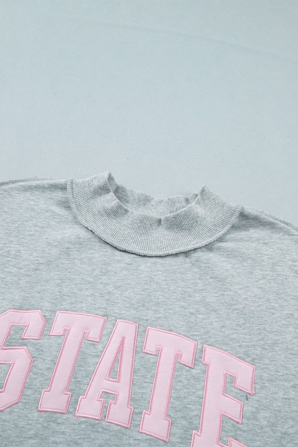 STATE Embroidered Exposed Seam Mock Neck Sweatshirt - Rooted & Reckless Co.
