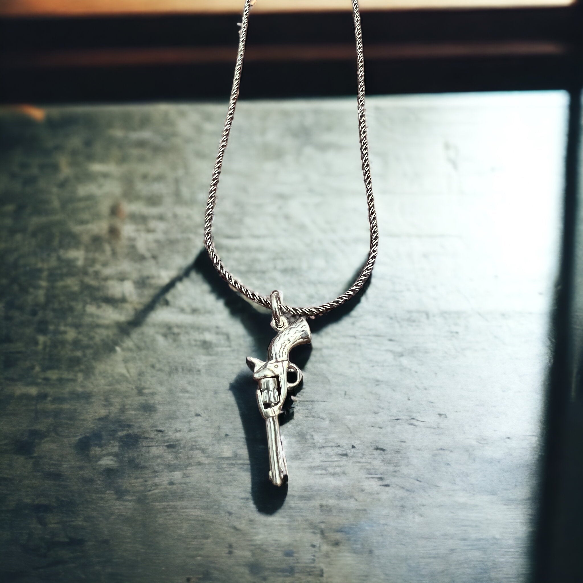 Sterling Silver 3D Pistol Charm/Pendant — Cowboy Six-Shooter with Woodgrain Grips, Oxidized for Detail - Rooted & Reckless Co.