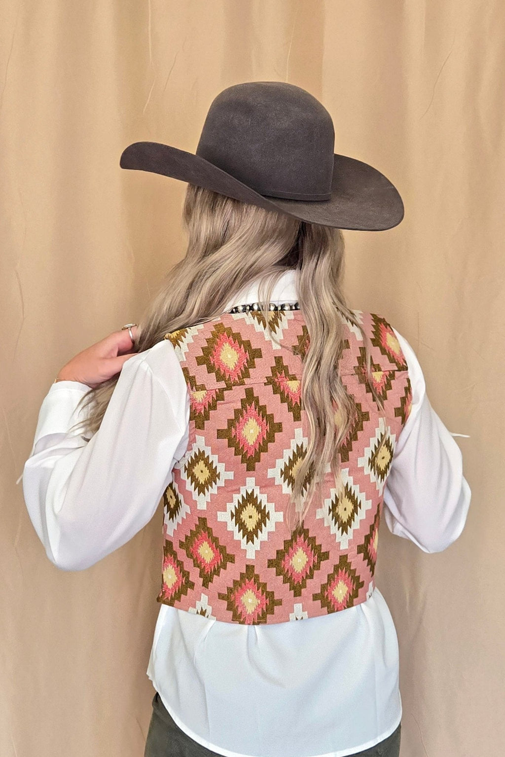 Turquoise Haven Pink Southwest Tapestry Snap Western Vest — Woven Geometric Print with Antique Brass Snap Closure - Rooted & Reckless Co.