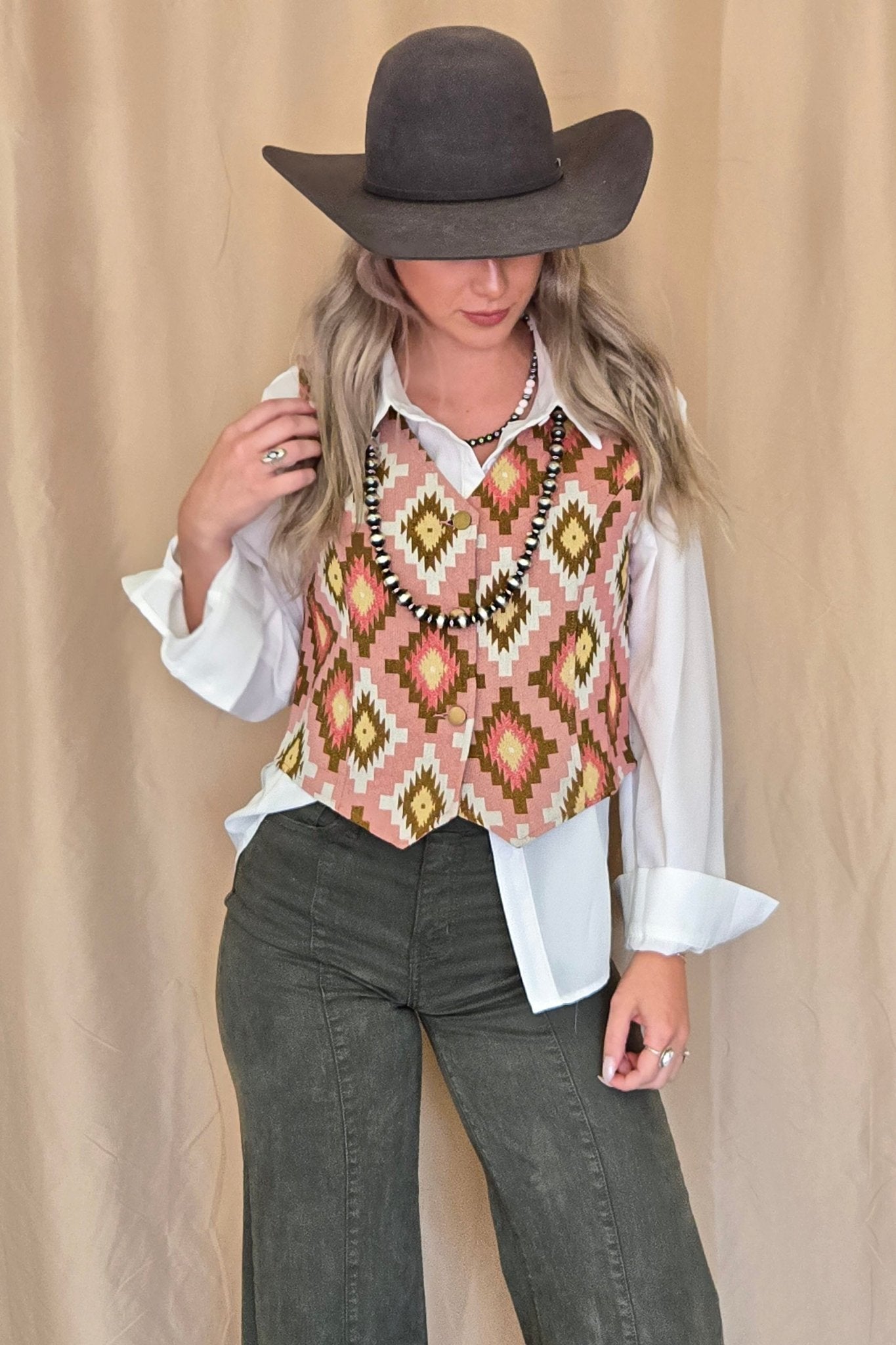 Turquoise Haven Pink Southwest Tapestry Snap Western Vest — Woven Geometric Print with Antique Brass Snap Closure - Rooted & Reckless Co.