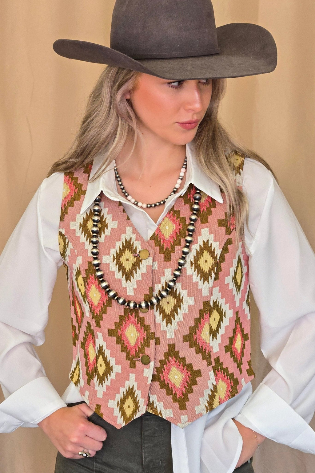 Turquoise Haven Pink Southwest Tapestry Snap Western Vest — Woven Geometric Print with Antique Brass Snap Closure - Rooted & Reckless Co.