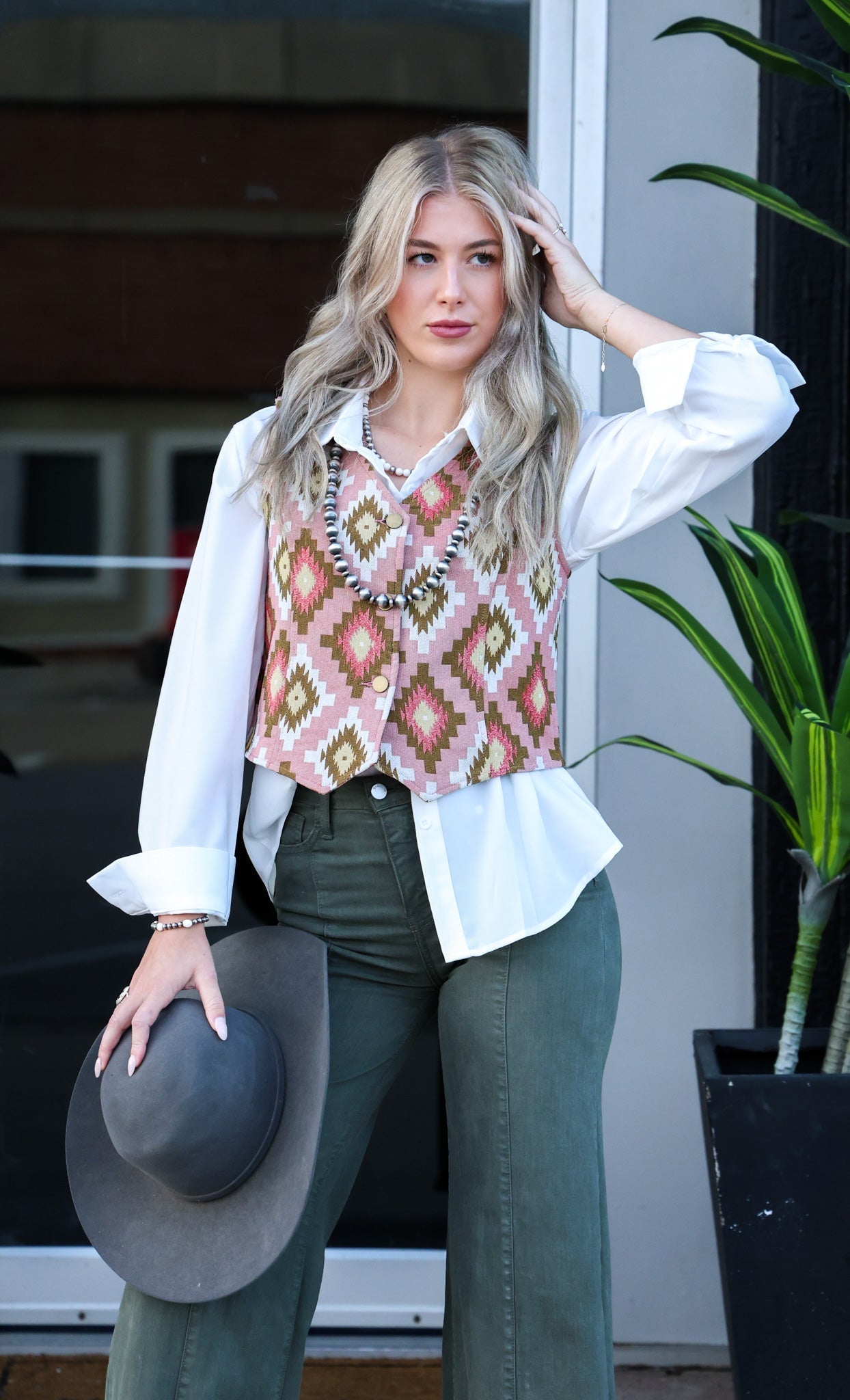 Turquoise Haven Pink Southwest Tapestry Snap Western Vest — Woven Geometric Print with Antique Brass Snap Closure - Rooted & Reckless Co.